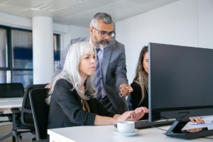 Image shows a diverse background work culture.
